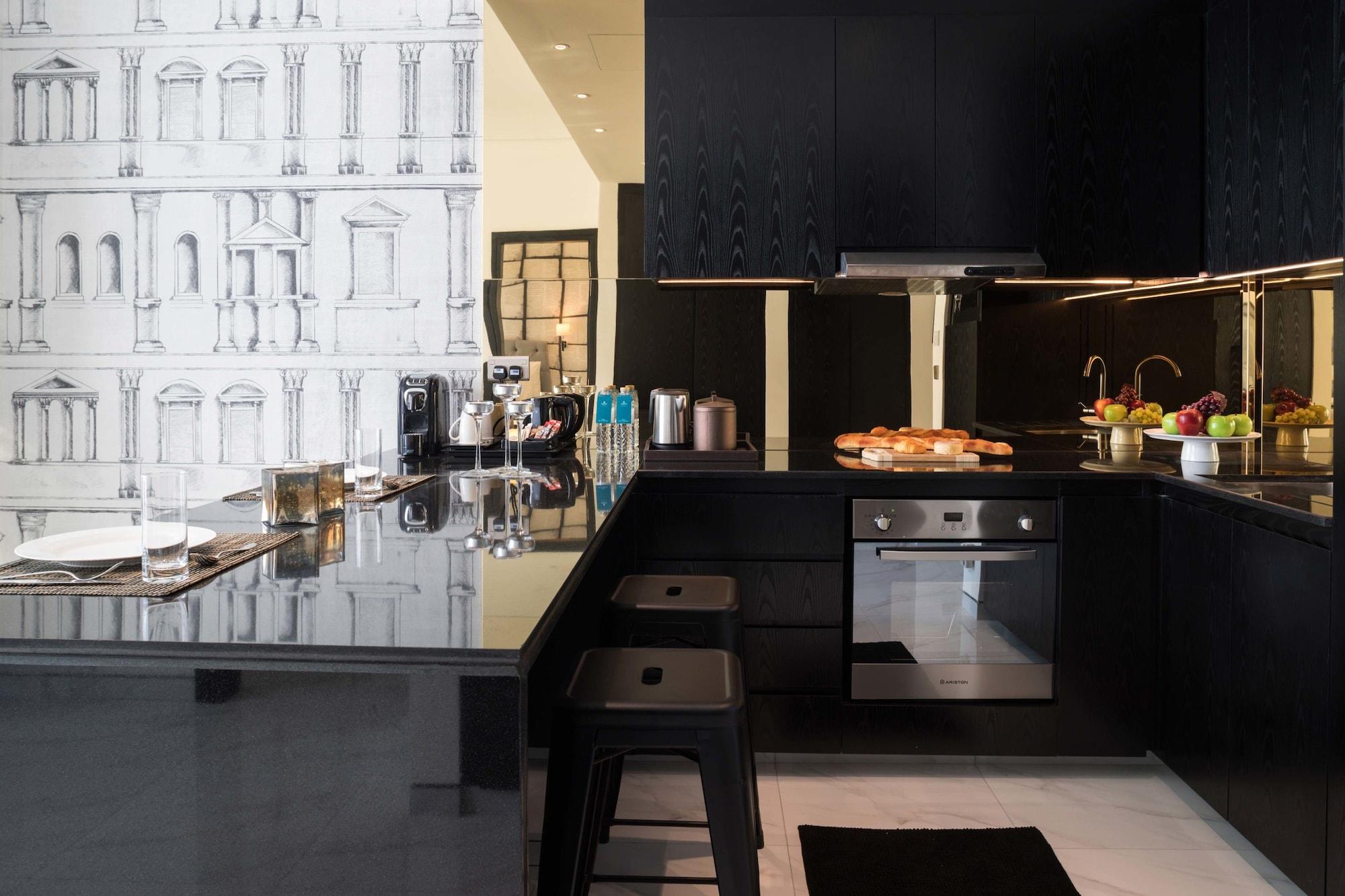 Aparthotel Millennium Atria Business Bay Dubai Exterior foto A kitchen in a private home