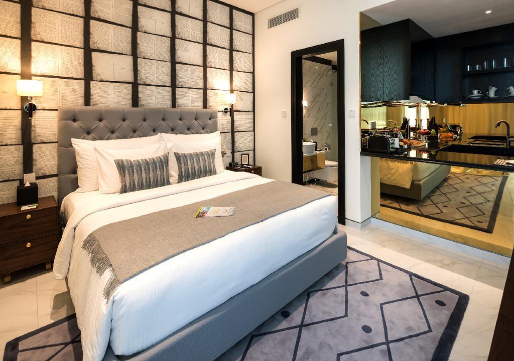 Aparthotel Millennium Atria Business Bay Dubai Exterior foto A bedroom at the hotel